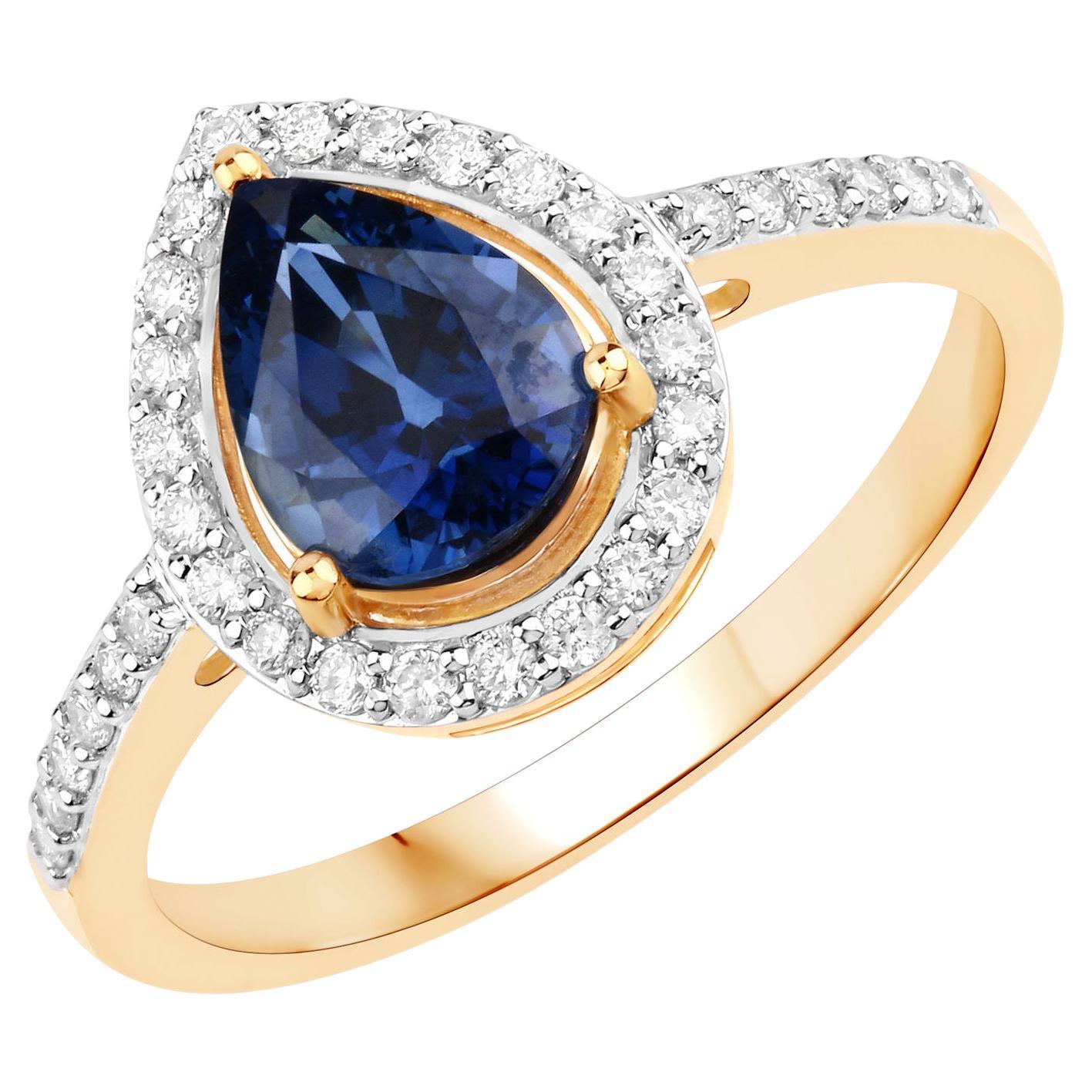 Bague en or jaune 14 carats avec saphir bleu vif en forme de poire et diamants