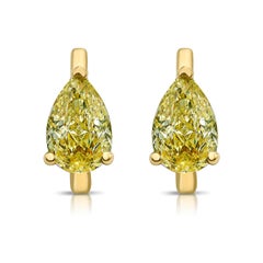 Orecchini a forma di pera con diamanti gialli