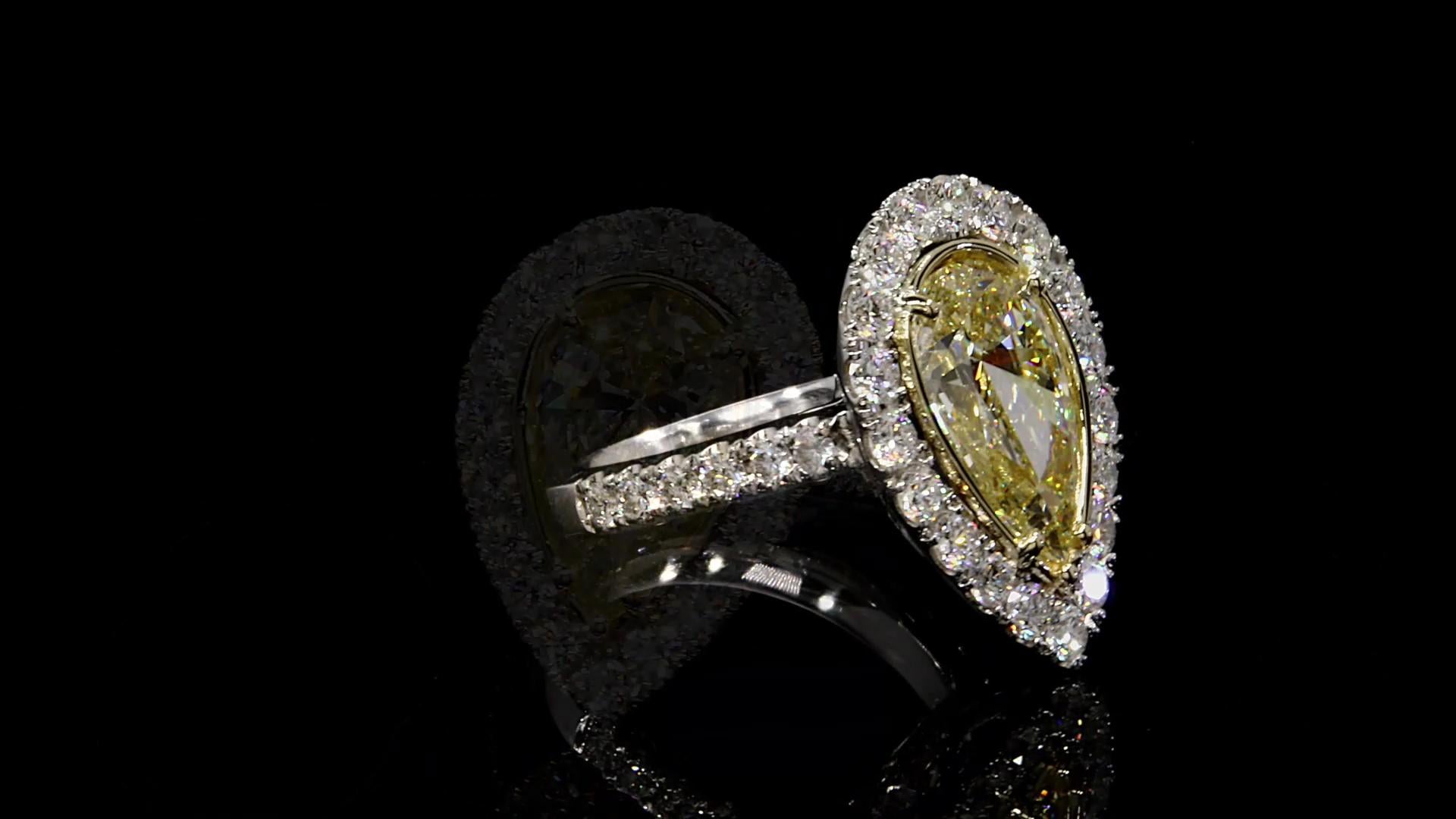 Pear Cut GIA Certified 3.02 Carat Pear Shape Yellow Diamond Ring