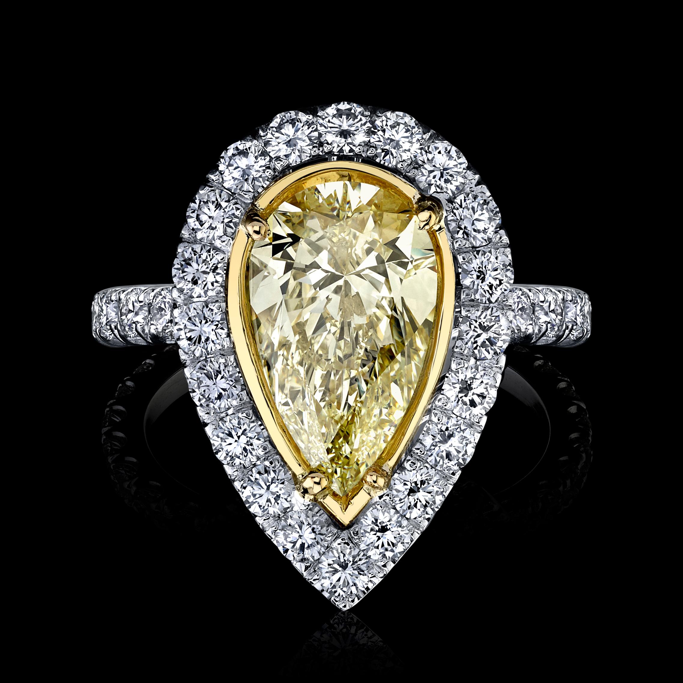 Yellow Pear Shape Diamond Ring 3.02 carats Center Diamond
 
Set with 2.07 carats Micro pave.

Spectacular. Set in Platinum/18KYG

Stunning! Looks like nice FANCY YELLOW.

Pear Shape Diamond weighs 3.02 carats. 

Y-Z Color SI1 Clarity

With GIA