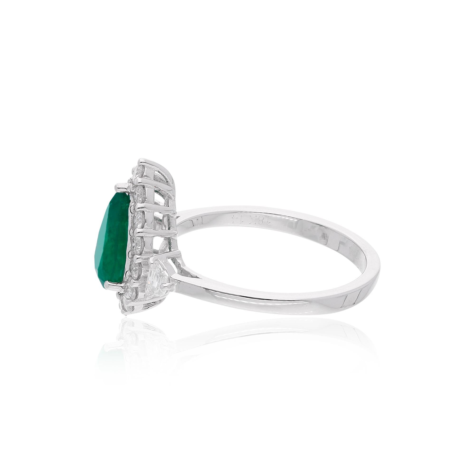 Item Code :- SER-22717
Gross Wt. :- 3.76 gm
18k white Gold Wt. :- 3.40 gm
Natural Diamond Wt. :- 0.63 Ct. ( AVERAGE DIAMOND CLARITY SI1-SI2 & COLOR H-I )
Natural Emerald Wt. :- 1.17 Ct. 
Ring Size :- 7 US & All size available

✦ Import Duties, Taxes