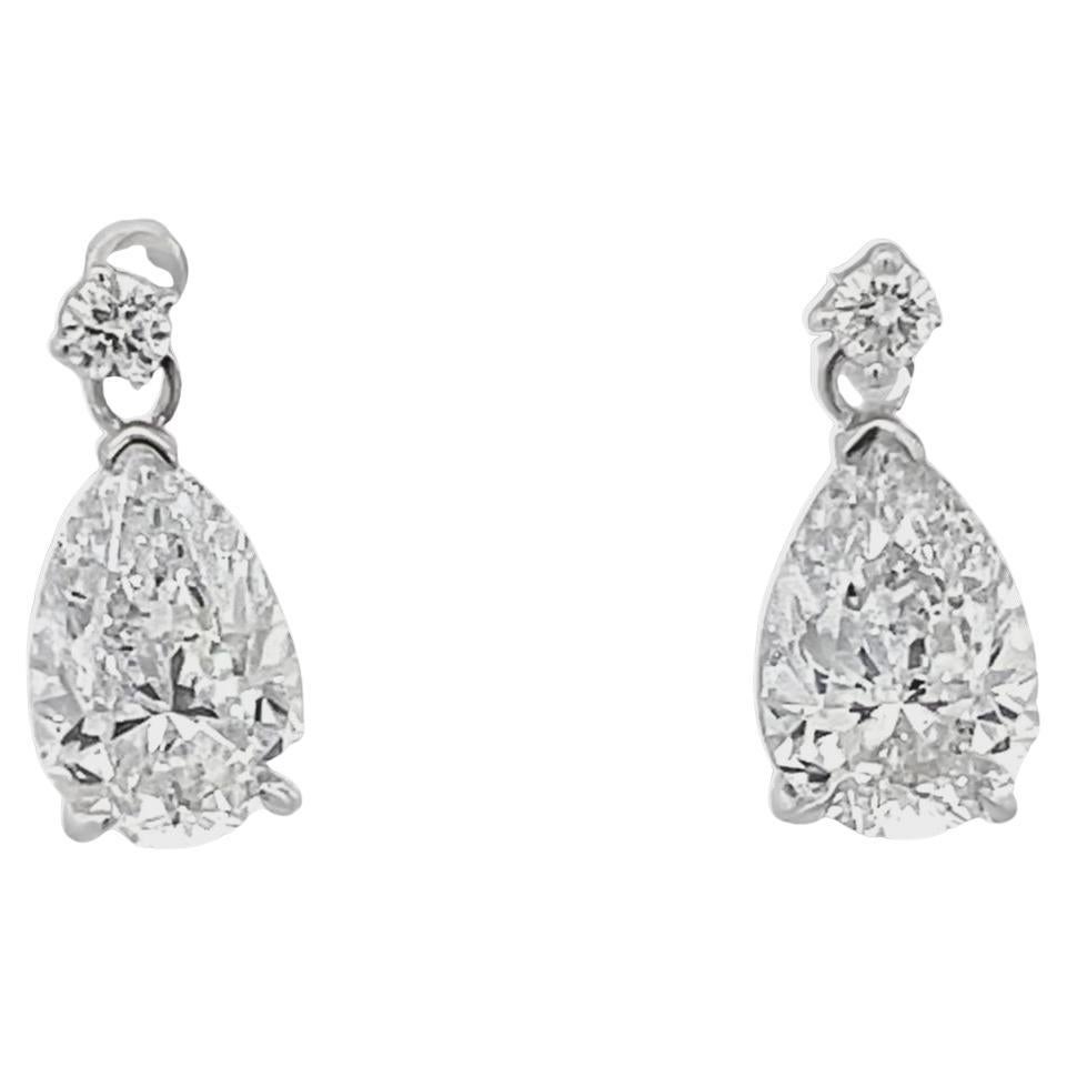 Boucles d'oreilles pendantes en or blanc 18K avec diamants en forme de poire