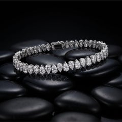 26.09ct Pear Shape GIA Diamond 18K White Gold Tennis Bracelet