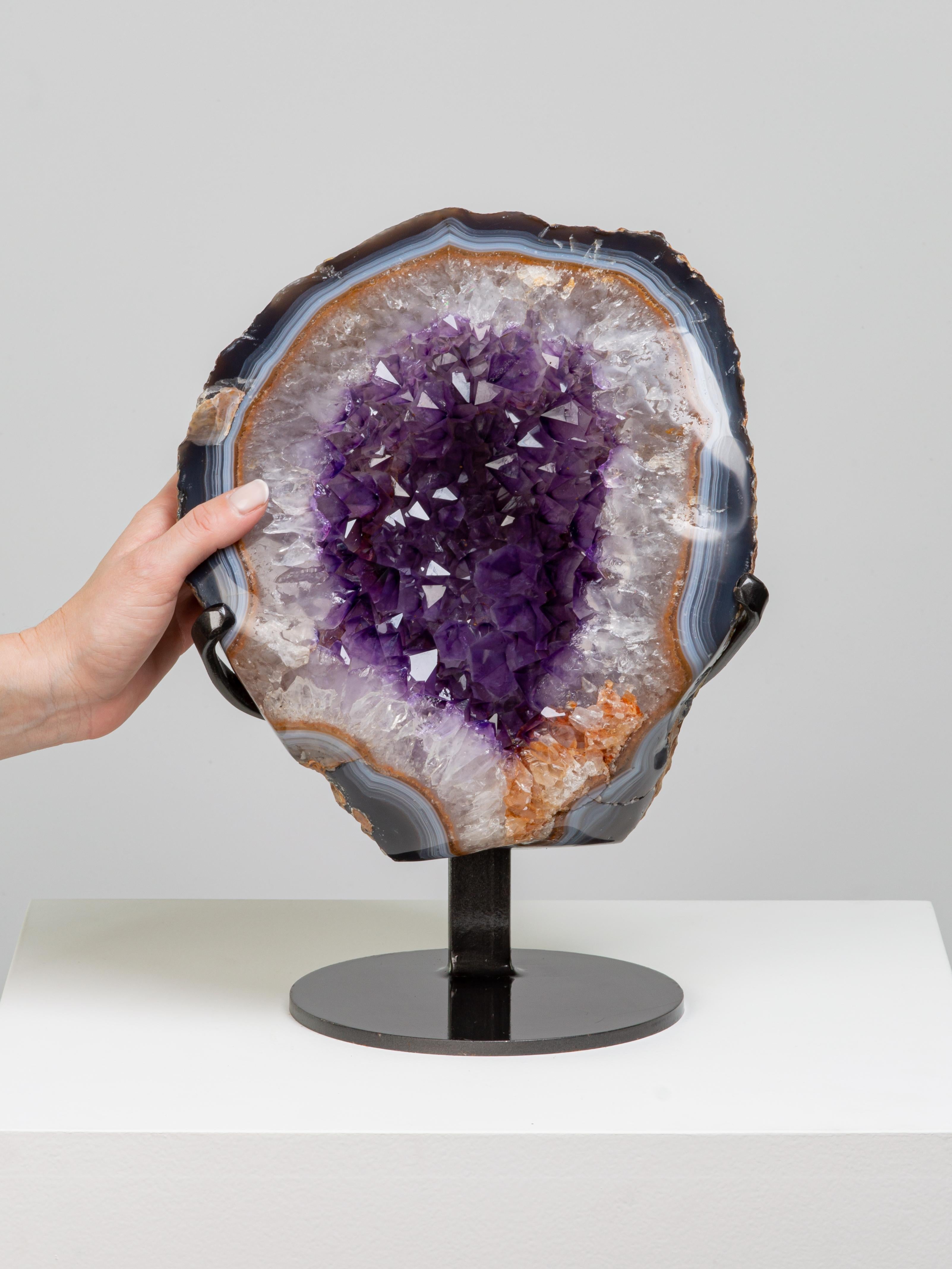 Uruguayan Pear Shaped Amethystine Geode Section with Thick Border For Sale