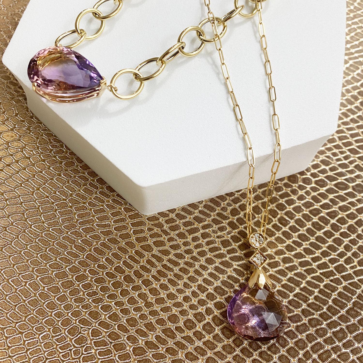 14K Yellow Gold

1 Pear Shaped Ametrine at approximately 17.10 Carats Total Weight

0.15 Carats Total Weight of Round White Brilliant Diamond 

Clarity: SI / Color: H-I

Fine one-of-a-kind craftsmanship meets incredible quality in this breathtaking
