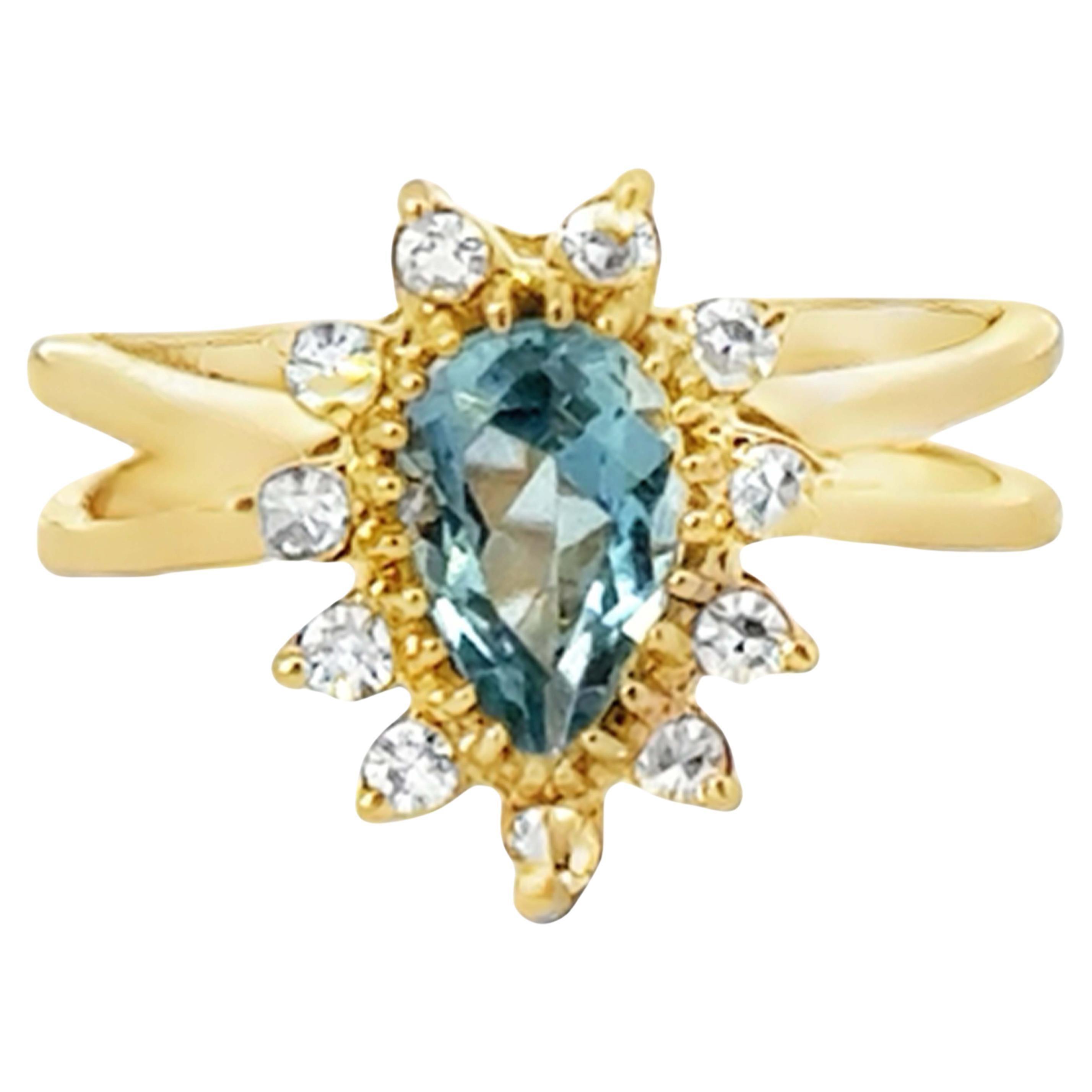 Anillo Halo de Aguamarina y Diamante en Forma de Pera Oro Amarillo de 14k
