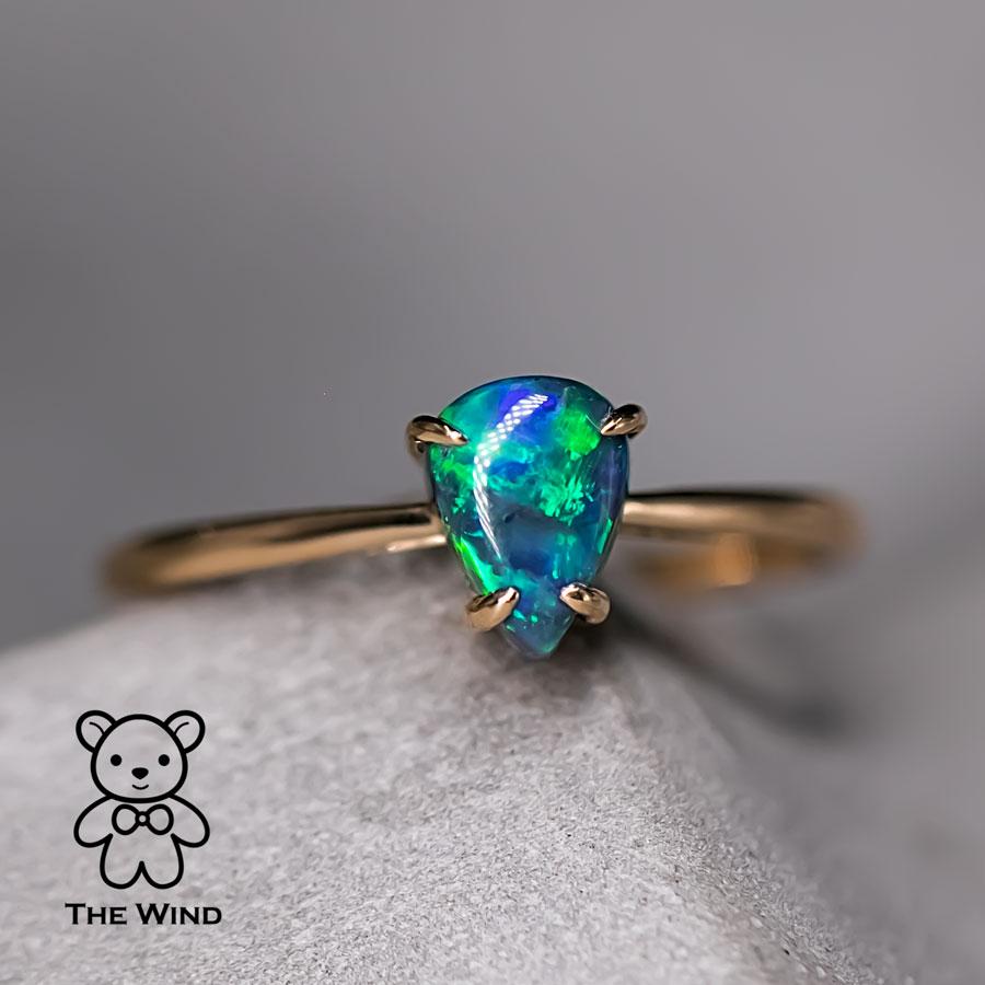 Pear Shaped Australian Black Opal Engagement Wedding Ring 18K Yellow Gold.


Free Domestic USPS First Class Shipping! Free Gift Bag or Box with every order!

Opal—the queen of gemstones, is one of the most beautiful gemstones in the world. Every
