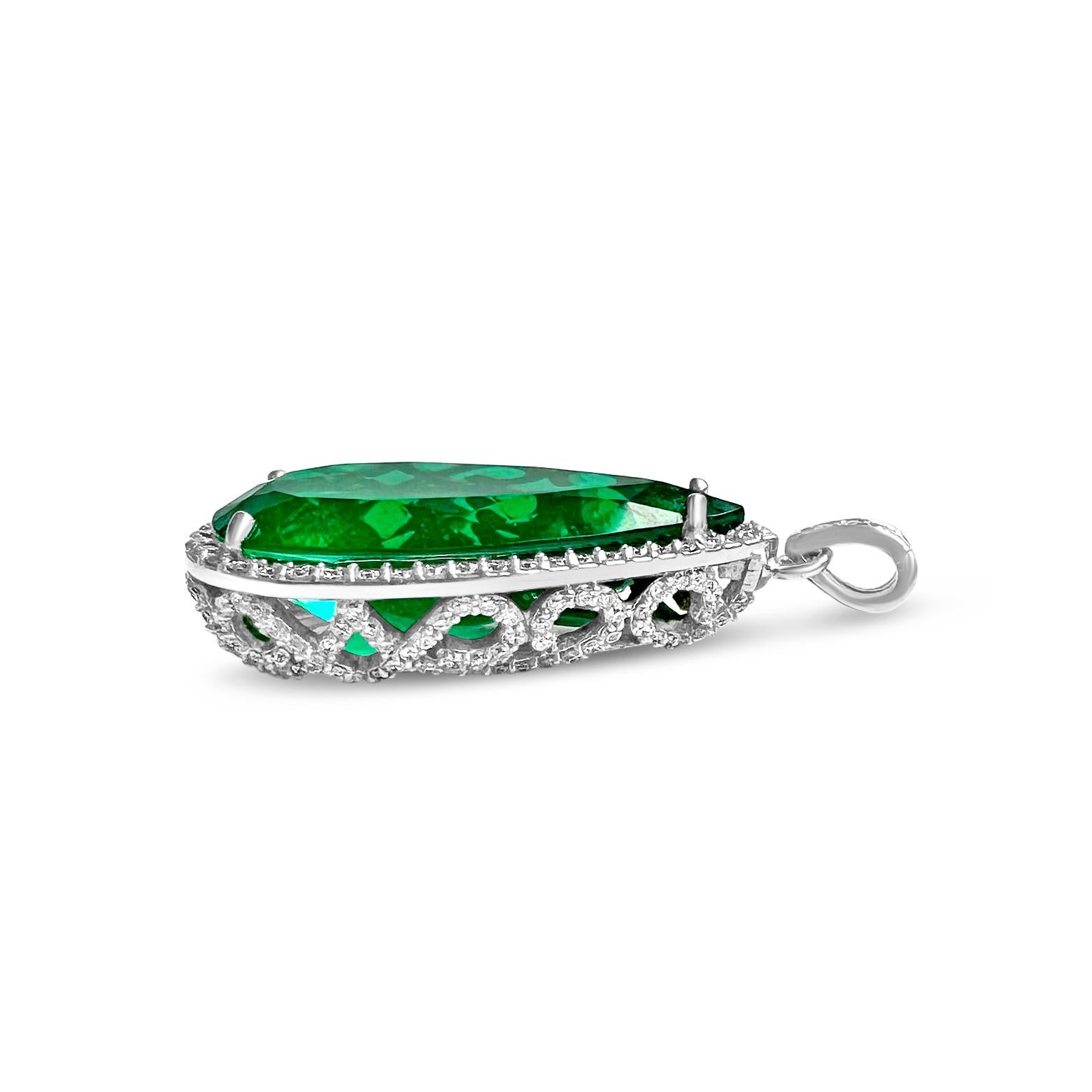 14KW Pendant with 190 Round 1.2mm Diamonds 1.48cts G-H SI & 1 Pear Shape 28x14mm Beryl Emerald 17.96cts (with 14KW Rolo #035 Chain 16