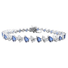 Armband aus 14 Karat Weißgold mit blauem Saphir und Diamant in Birnenform, 6,76 Karat