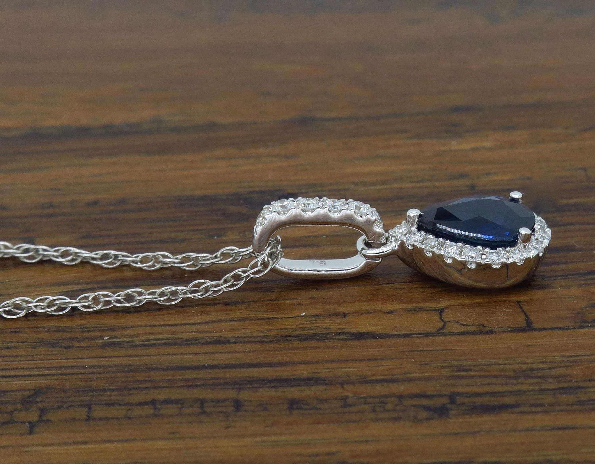 Women's or Men's Pear Shaped Blue Sapphire and Diamond Halo Pendant