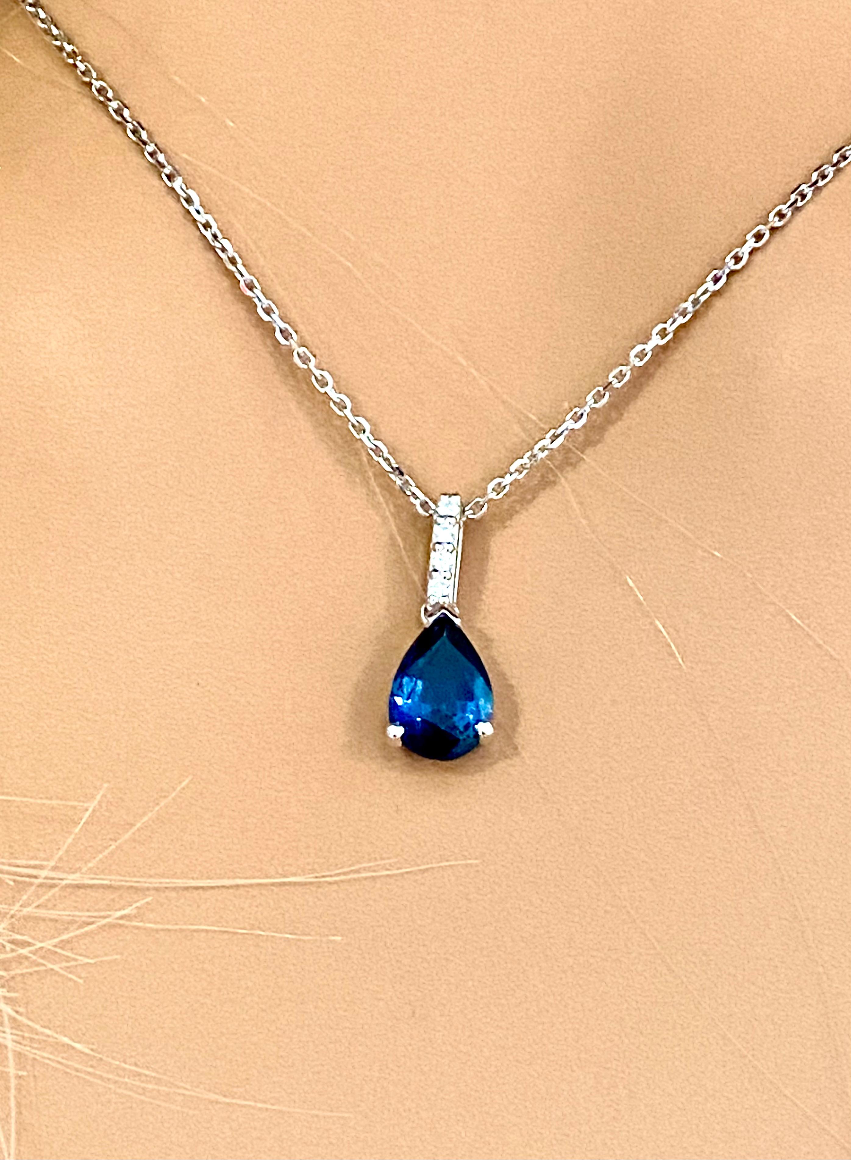 Modern Pear Shaped Blue Sapphire and Diamond White Gold Trending Pendant Necklace For Sale