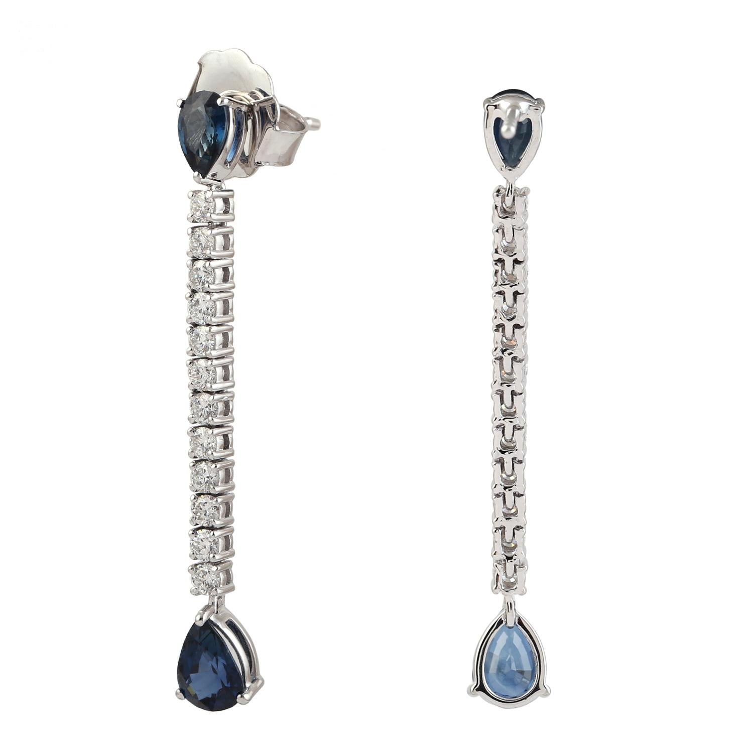 Contemporary Pear Shaped Blue Sapphire Chain Earrings With Diamonds Made In 18k Gold For Sale