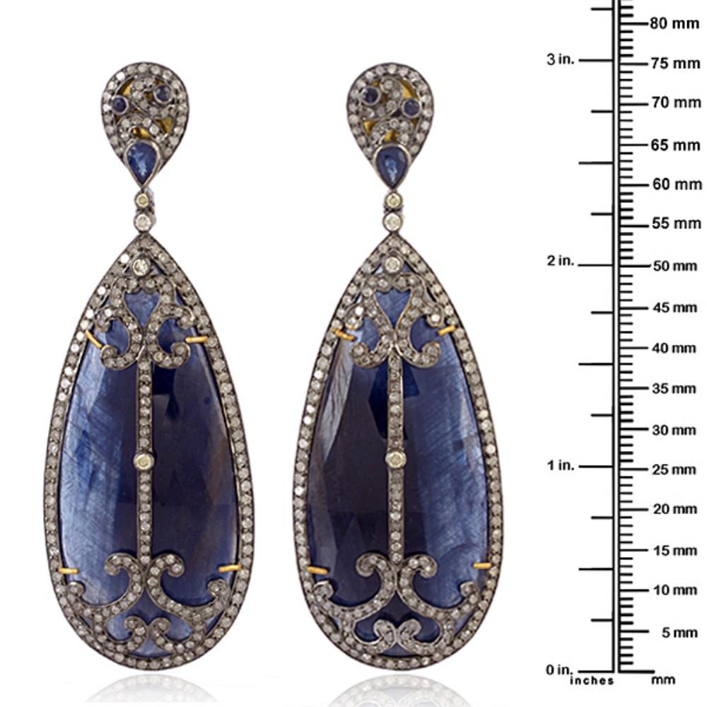 Mixed Cut Pear Shaped Blue Sapphire Earrings Caged in Fancy Diamonds in 18k Gold & Silver For Sale
