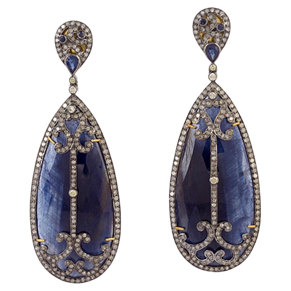 Pear Shaped Blue Sapphire Earrings Caged in Fancy Diamonds in 18k Gold & Silver For Sale