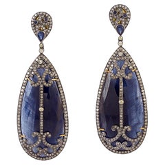 Pear Shaped Blue Sapphire Earrings Caged in Fancy Diamonds in 18k Gold & Silver