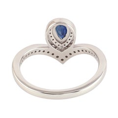 Pear Shaped Blue Sapphire Ring with Pave Diamonds Made in 18k White Gold