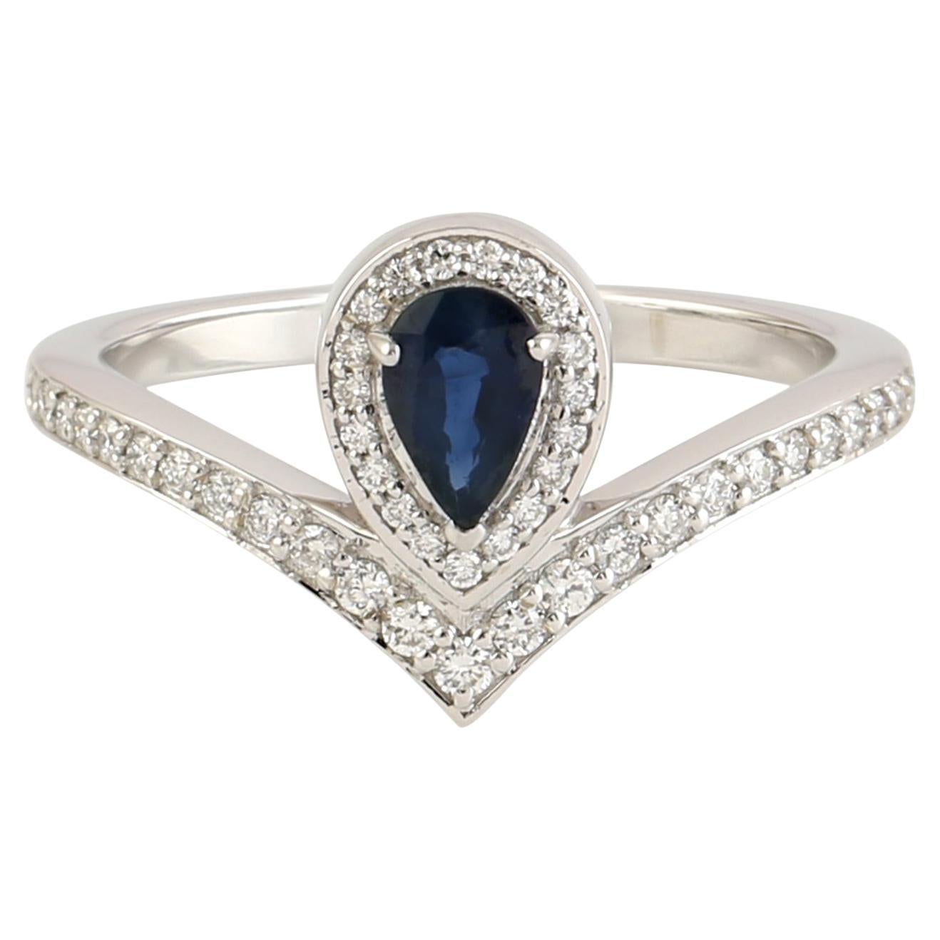 Pear Shaped Blue Sapphire Ring with Pave Diamonds Made in 18k White Gold For Sale