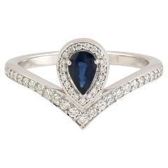 Pear Shaped Blue Sapphire Ring with Pave Diamonds Made in 18k White Gold