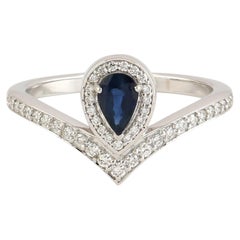 Pear Shaped Blue Sapphire Ring With Pave Diamonds Made in 18k White Gold
