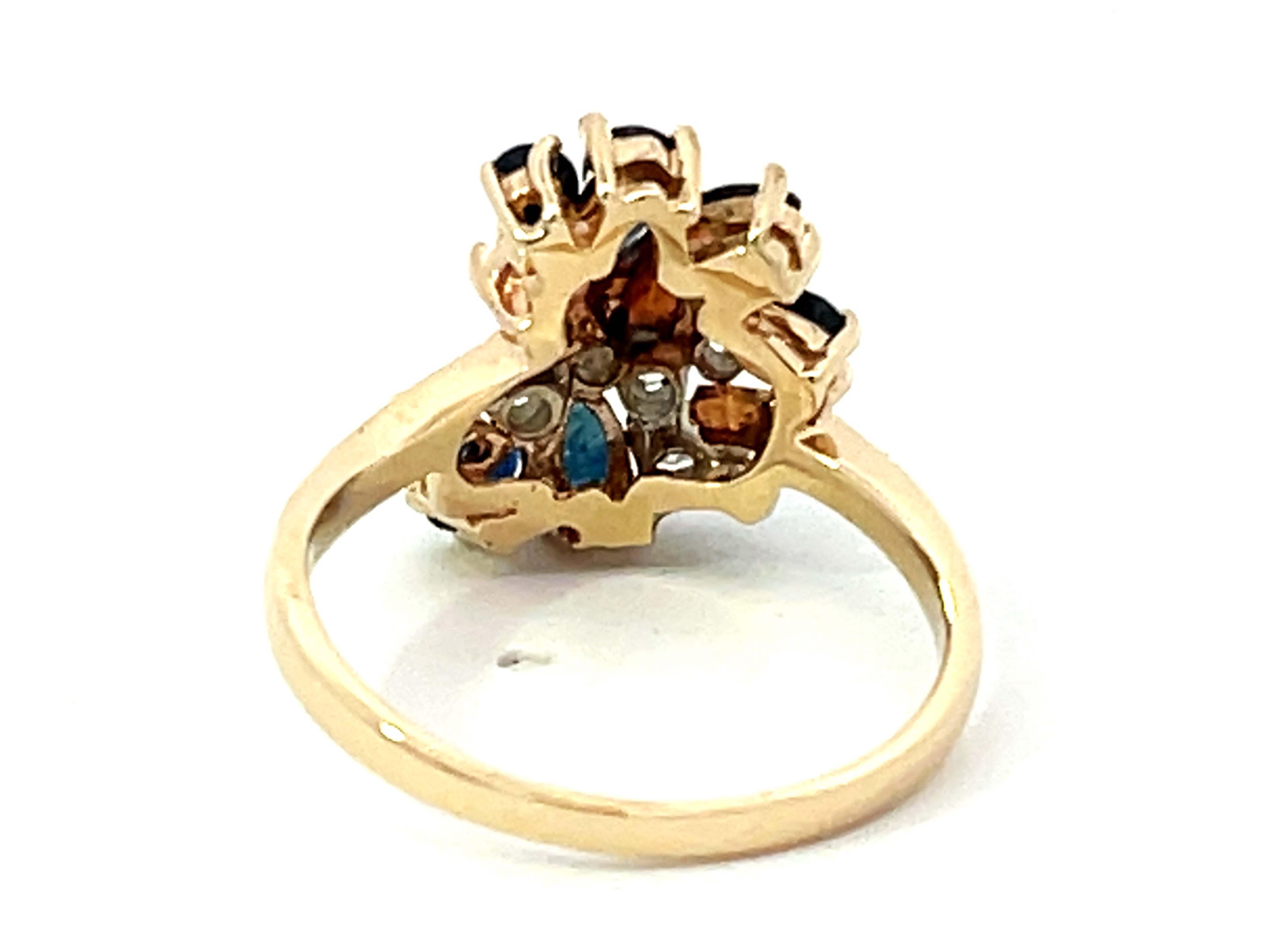 Ring aus 14 Karat Gelbgold mit birnenförmigen blauen Saphiren und Diamanten im Angebot 1