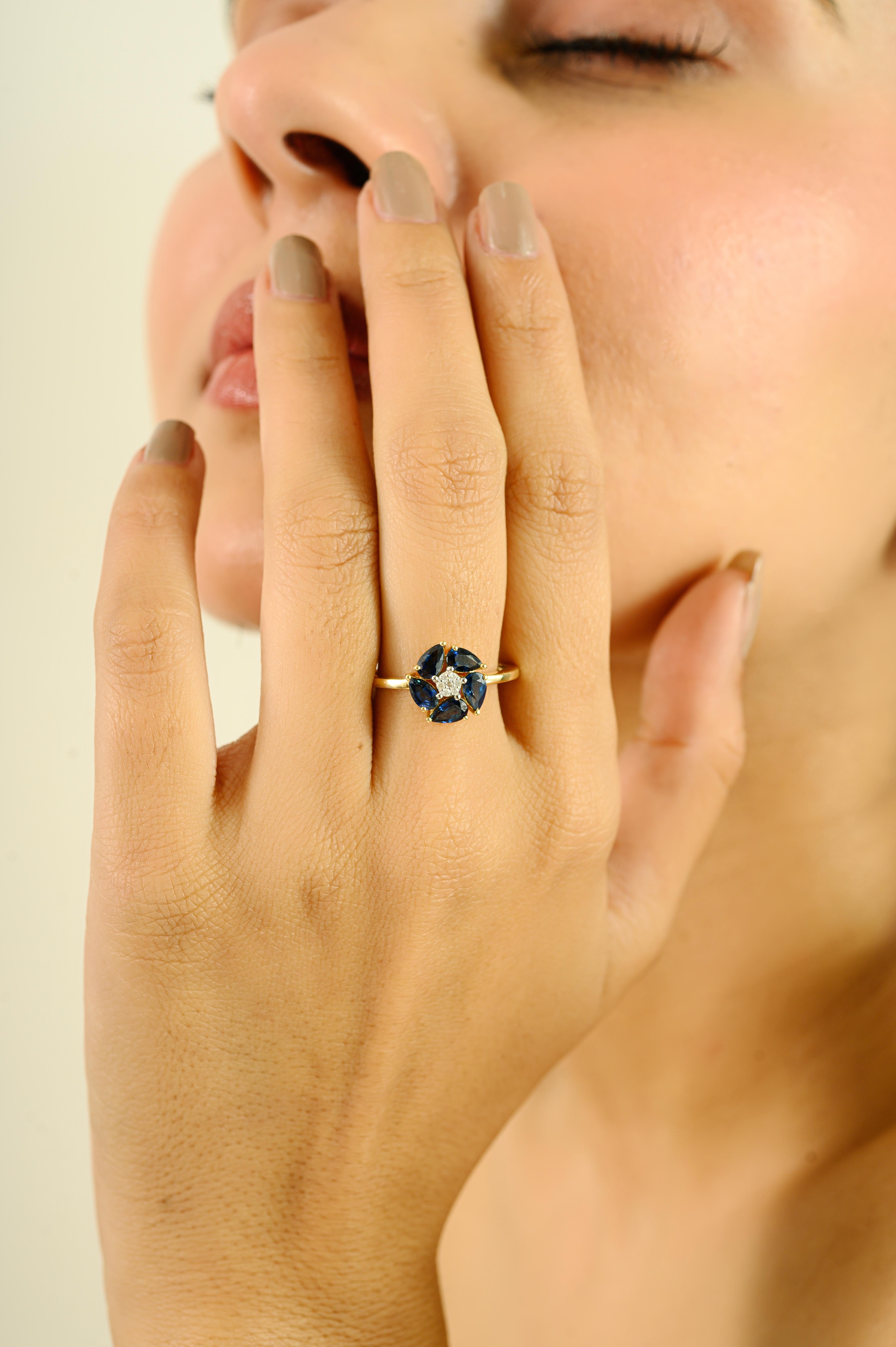 in vendita:  Anello a grappolo di zaffiri blu a forma di pera in oro giallo 14k con diamanti 4