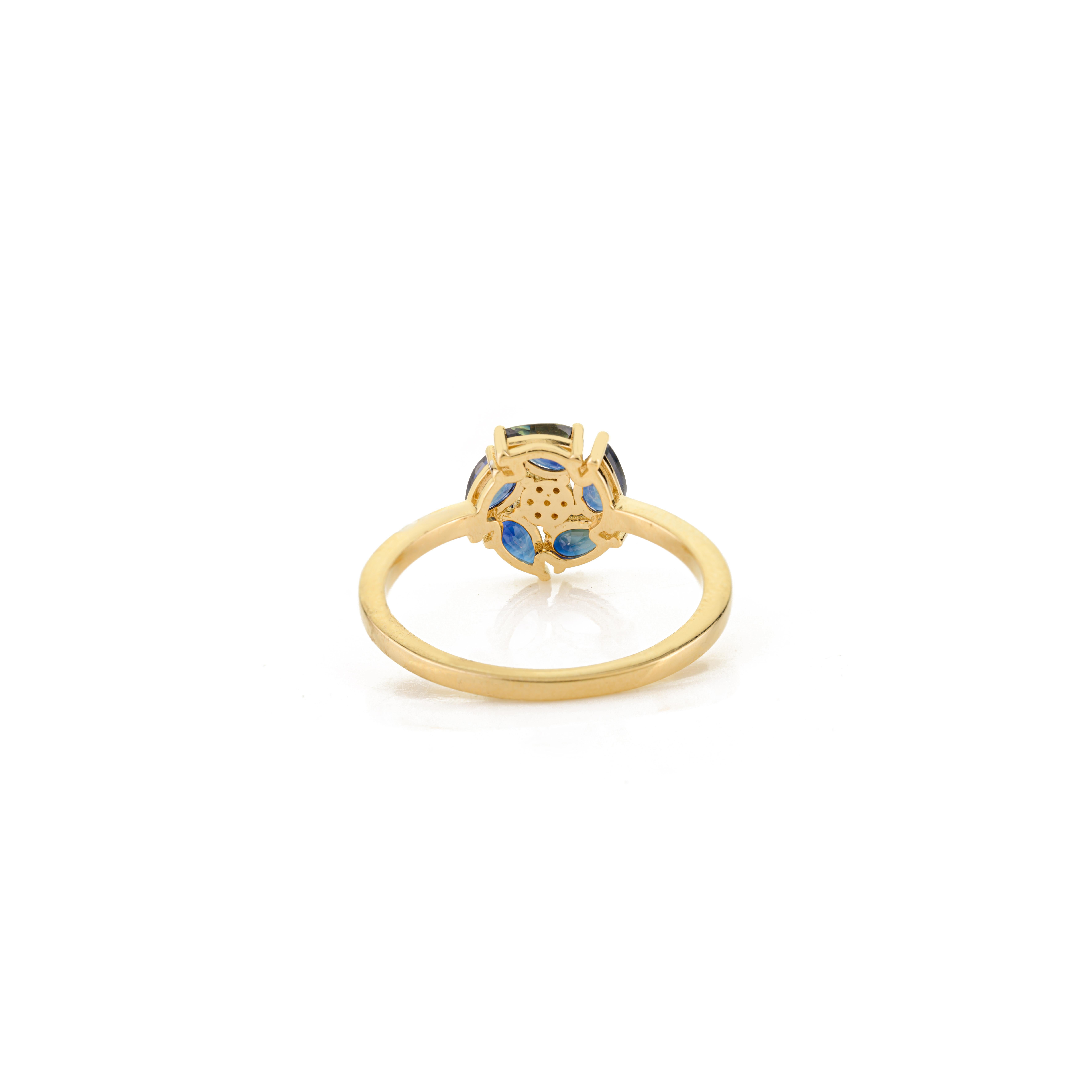 in vendita:  Anello a grappolo di zaffiri blu a forma di pera in oro giallo 14k con diamanti 5