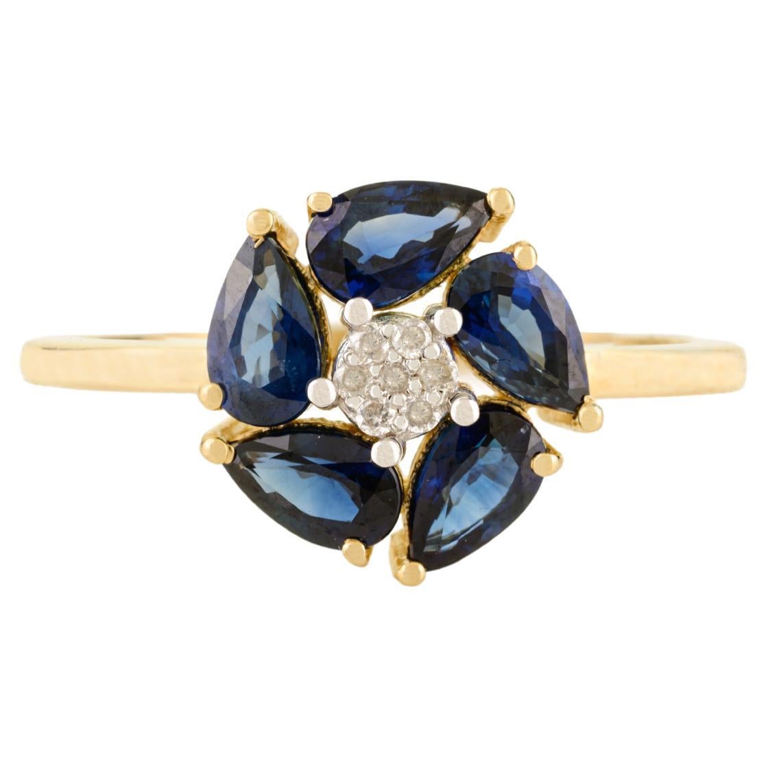 in vendita:  Anello a grappolo di zaffiri blu a forma di pera in oro giallo 14k con diamanti
