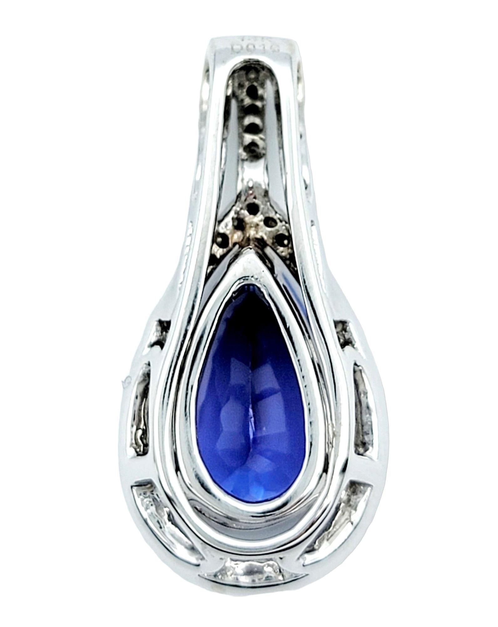 Pear Shaped Blue Tanzanite Pendant with Diamond Halo Set in 14 Karat White Gold For Sale 1