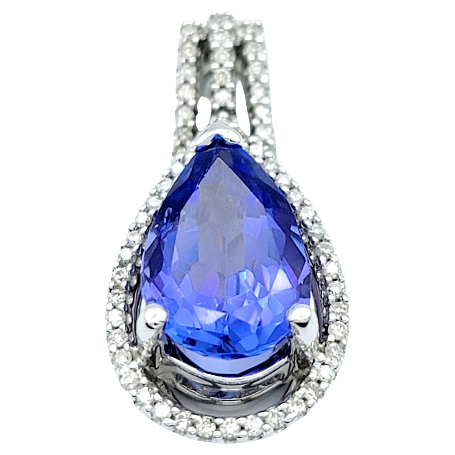 Pear Shaped Blue Tanzanite Pendant with Diamond Halo Set in 14 Karat White Gold For Sale