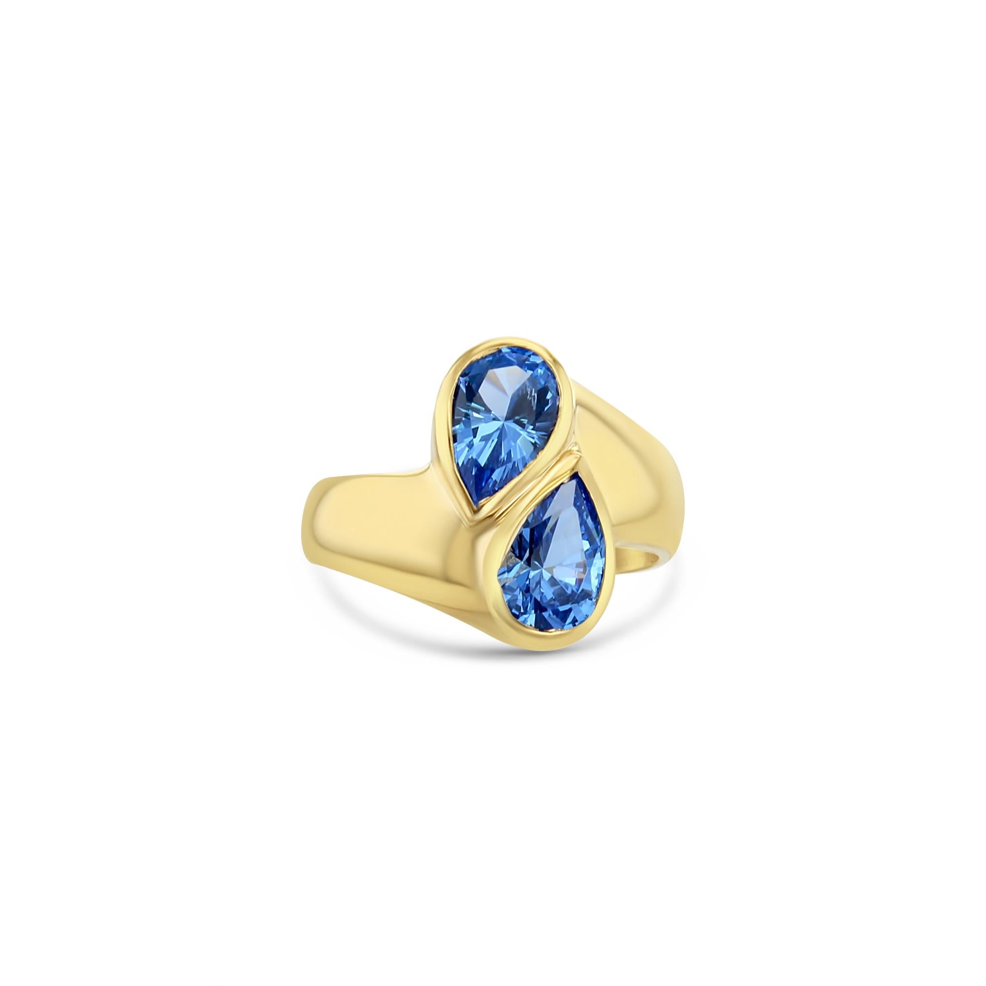 Bague bypass en or jaune 14 carats avec topaze bleue en forme de poire Neuf - En vente à Sugar Land, TX