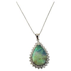 Pear-shaped Boulder Opal and Diamond Pendant Necklace in Platinum