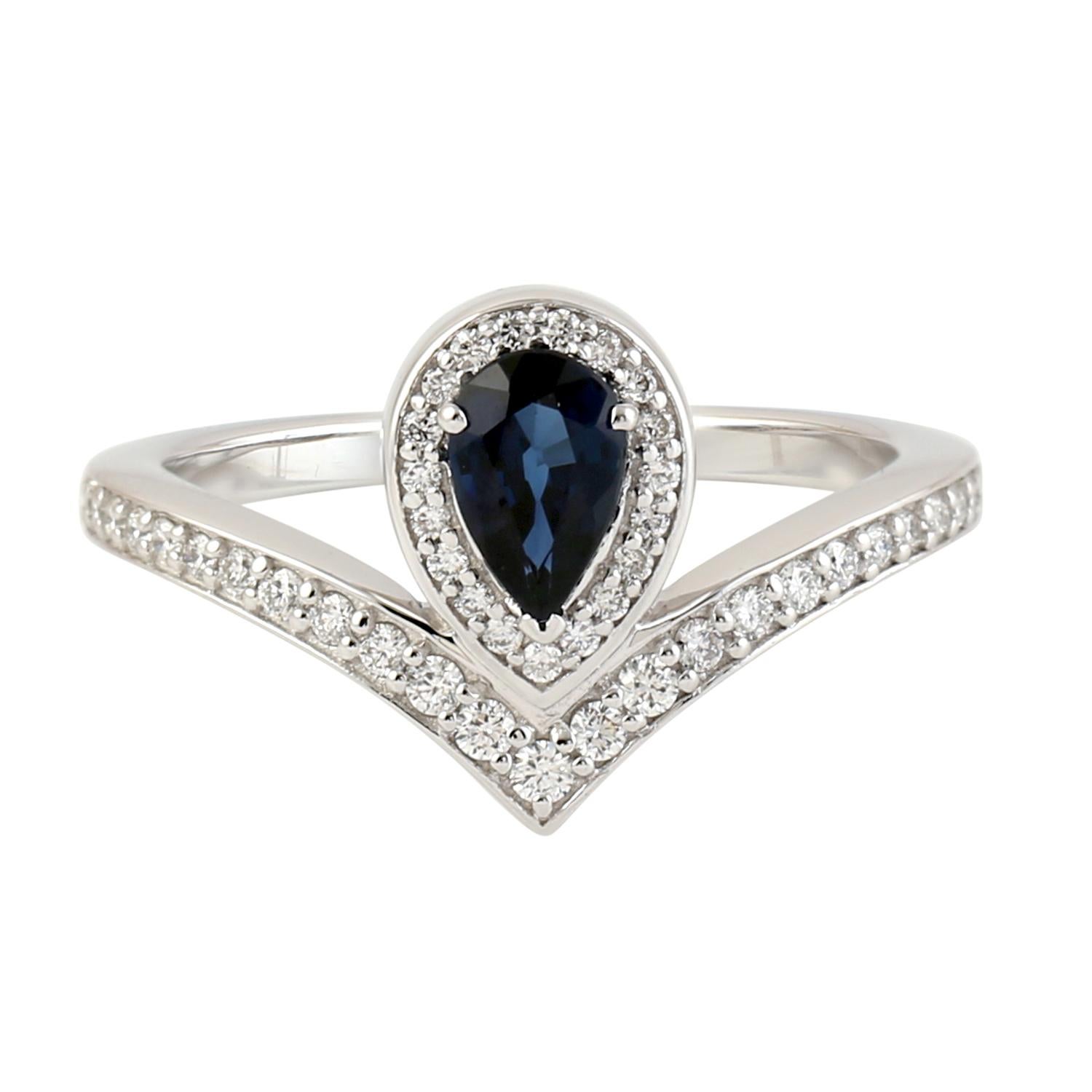 Contemporary Pear Shaped Center Stone Sapphire Ring With Diamonds Made In 18k Gold For Sale