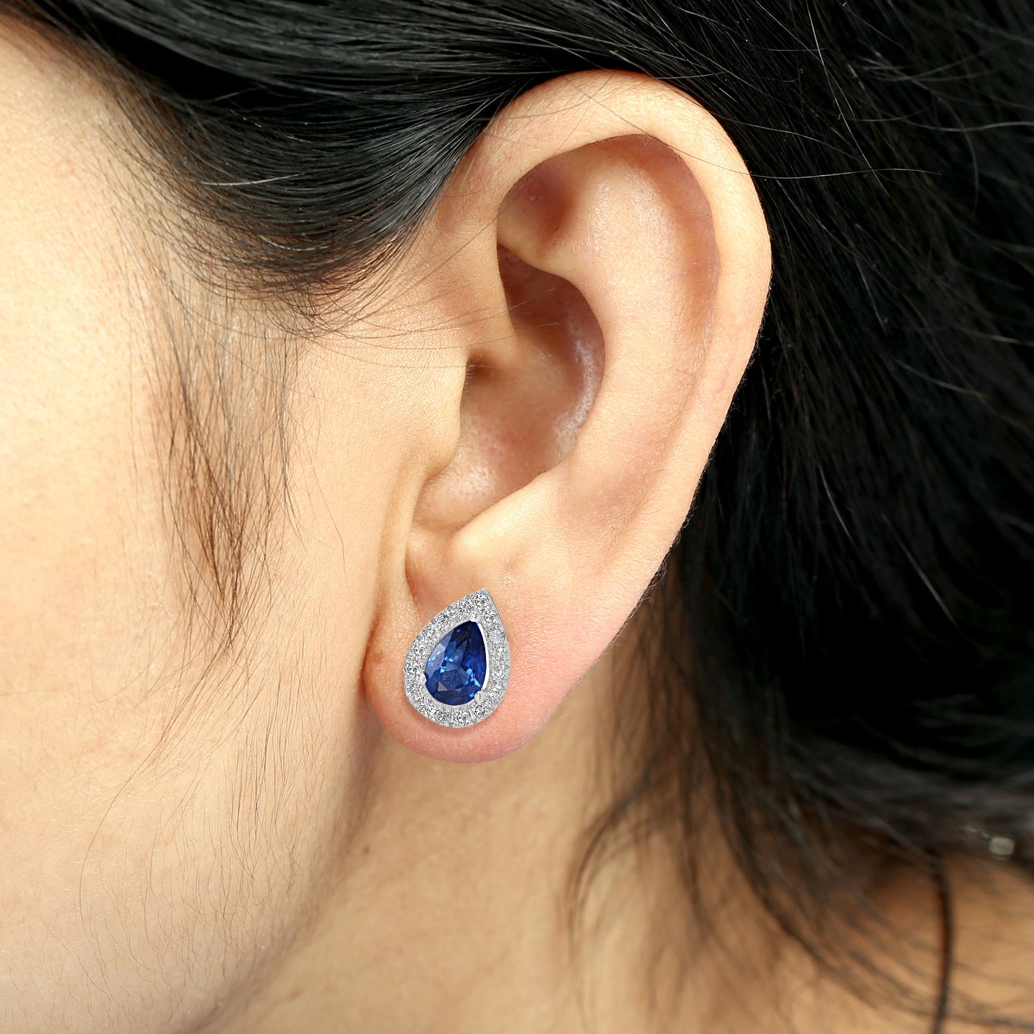 Designed with a minimal silhouette, these pear-shaped Ceylon blue sapphire studs are set in 18k gold and accented with 0.24 carats of diamonds. The deep blue sapphires bring subtle color, while the clean design keeps them versatile for everyday