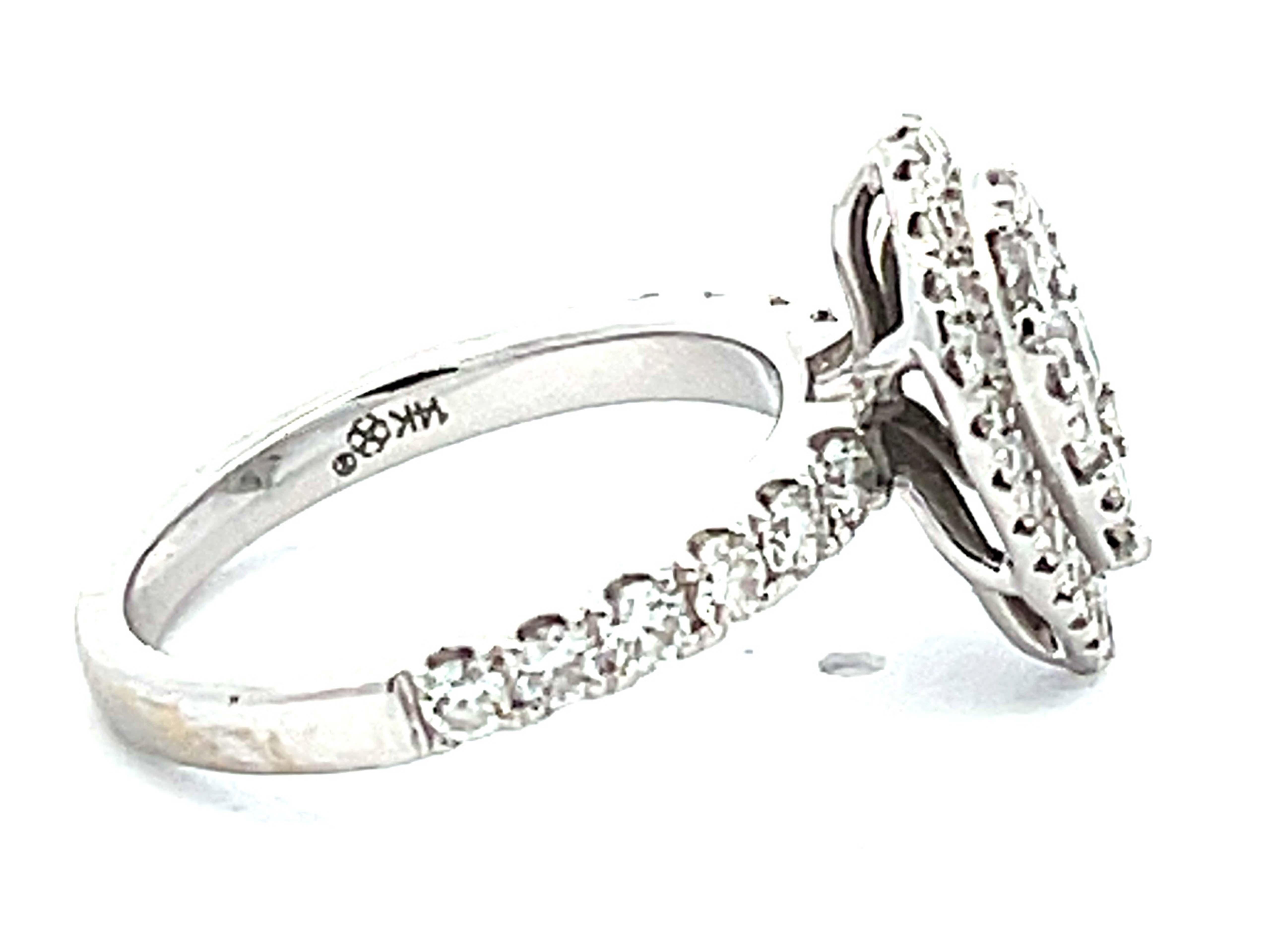 Pear Shaped Diamond Cluster Halo Engagement Ring in 14k White Gold In Excellent Condition For Sale In Honolulu, HI