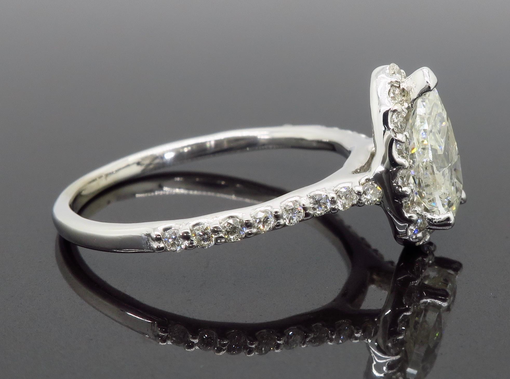 Pear Cut Pear Shaped Diamond Halo Engagement Ring