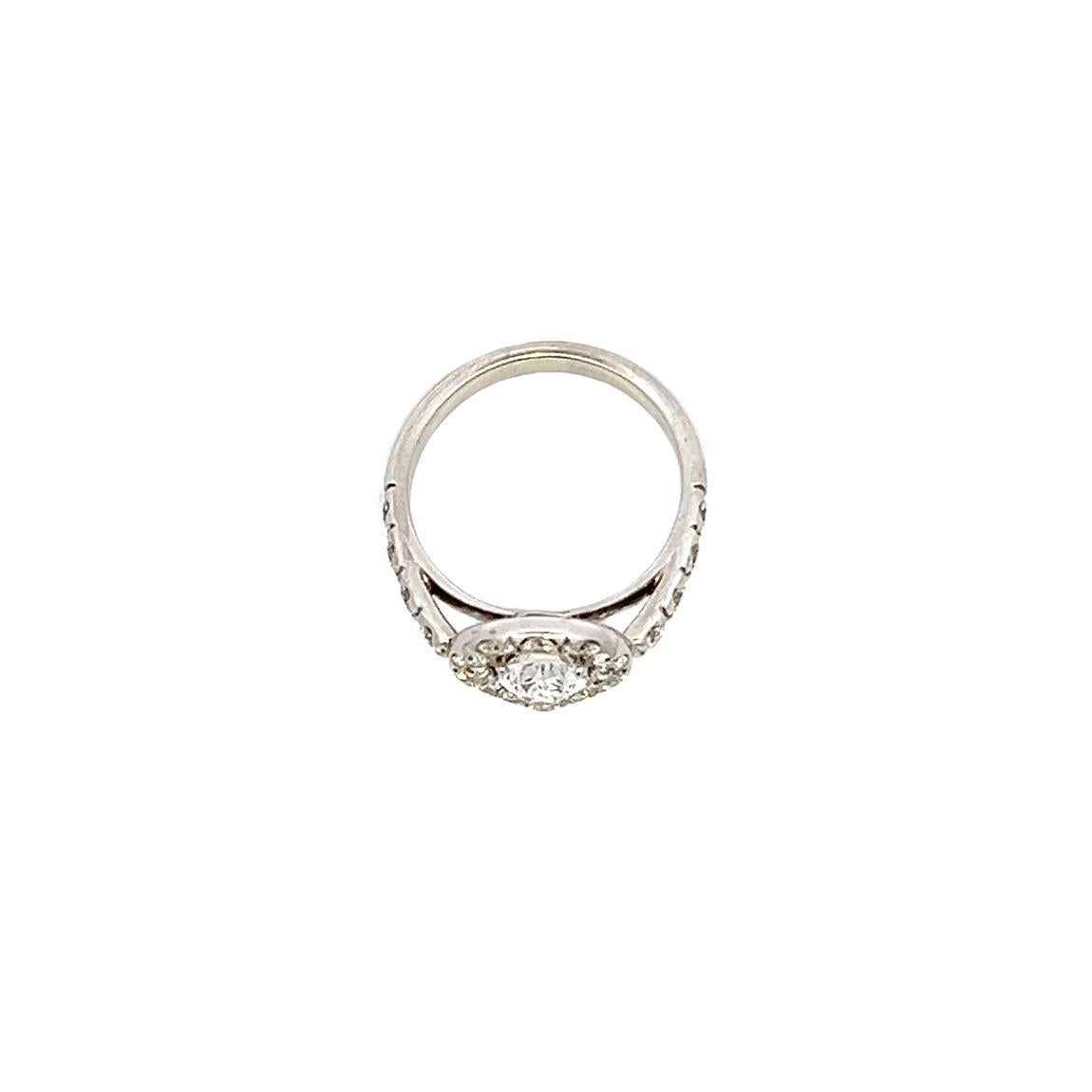 Pear Shaped Diamond Halo Ring in Platinum In New Condition For Sale In London, GB