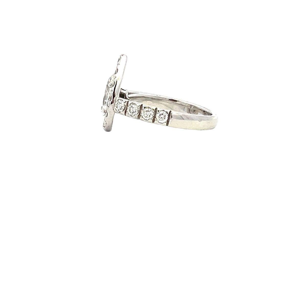 Women's Pear Shaped Diamond Halo Ring in Platinum For Sale