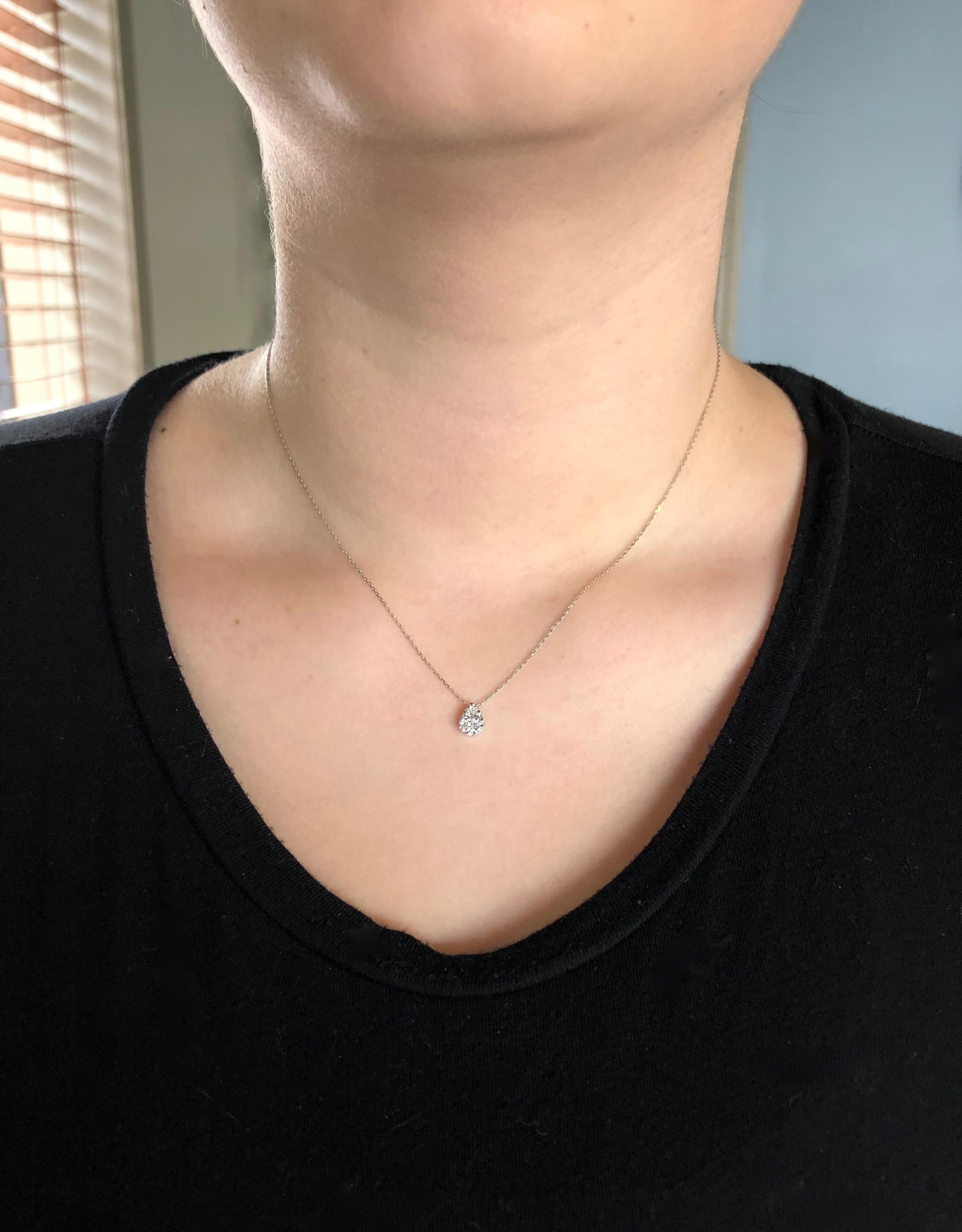 Pear shaped Diamond necklace is encrusted with .25CTW of Round Brilliant Cut Diamonds. The diamonds have G color and SI clarity.  This 14K white gold necklace is new and weighs 1.66 grams and is 17” in length.