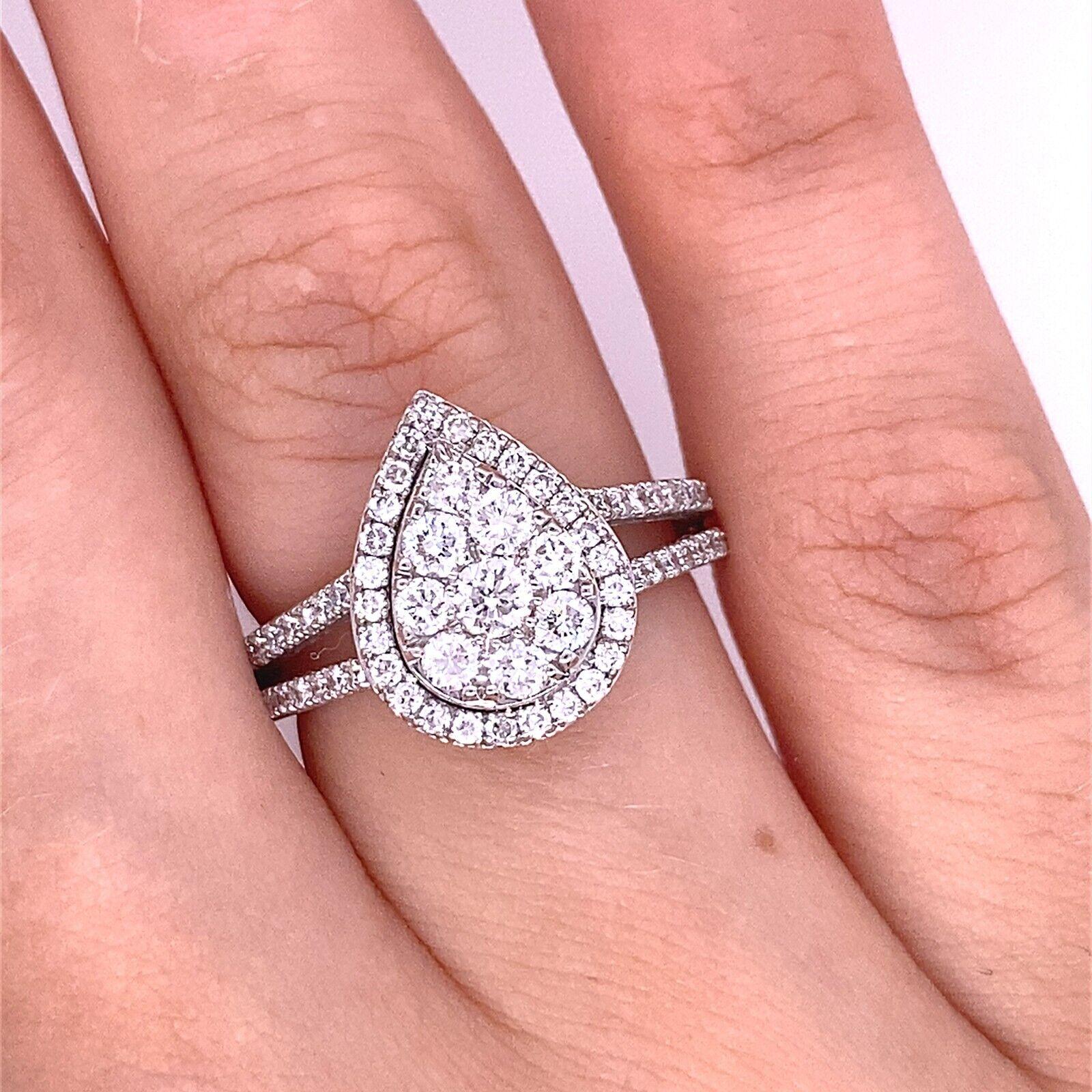 Pear Shaped Diamond Ring with Split Shank Diamond Set Shoulders In New Condition For Sale In London, GB