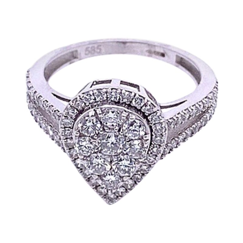 Birnenförmiger Diamantring mit geteiltem Schaft und diamantbesetzten Schultern im Angebot