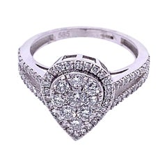 Pear Shaped Diamond Ring with Split Shank Diamond Set Shoulders