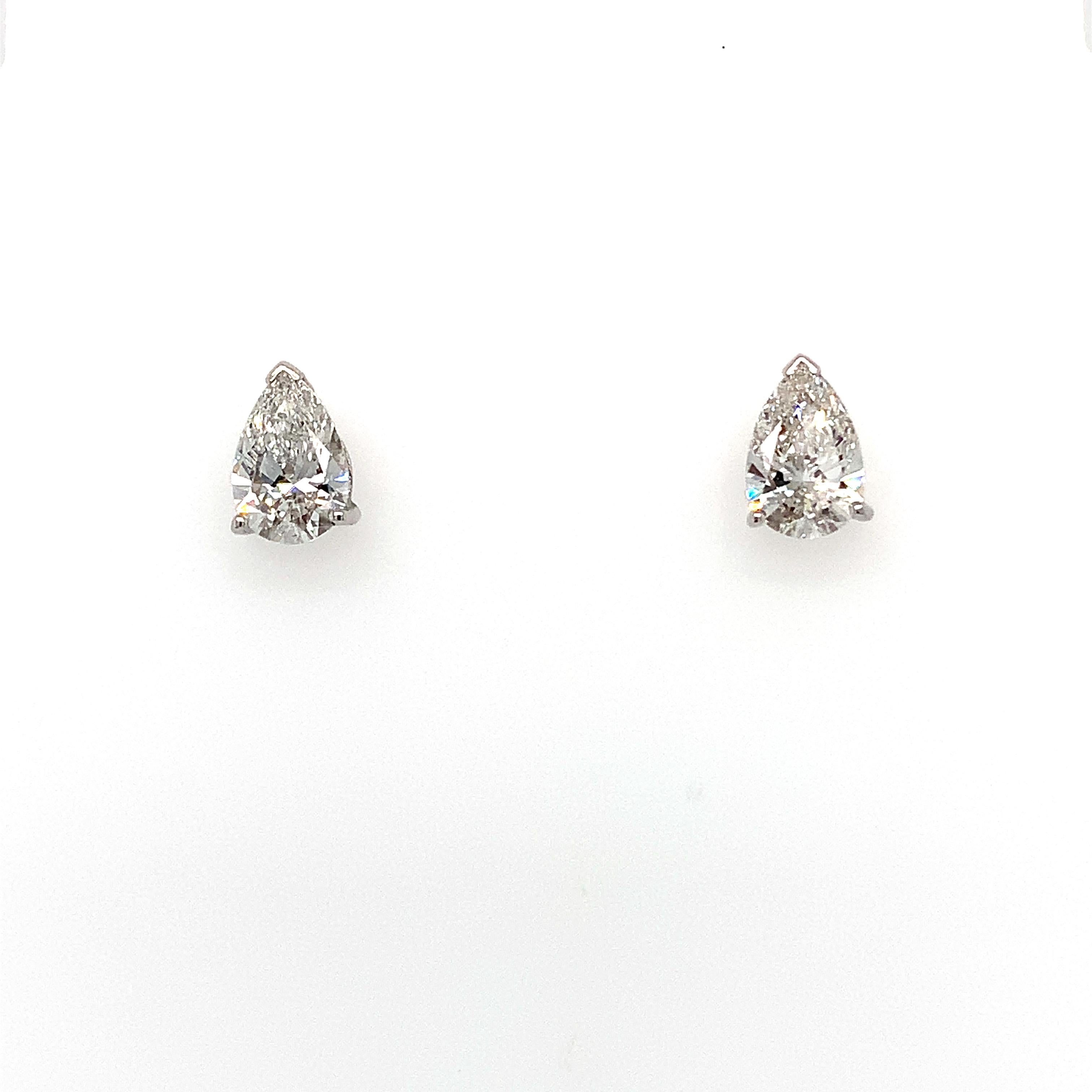 Pear Cut Pear shaped diamond stud earrings 18k white gold For Sale
