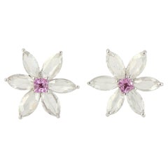 Boucles d'oreilles en or blanc 18k avec diamants en forme de poire et rubis