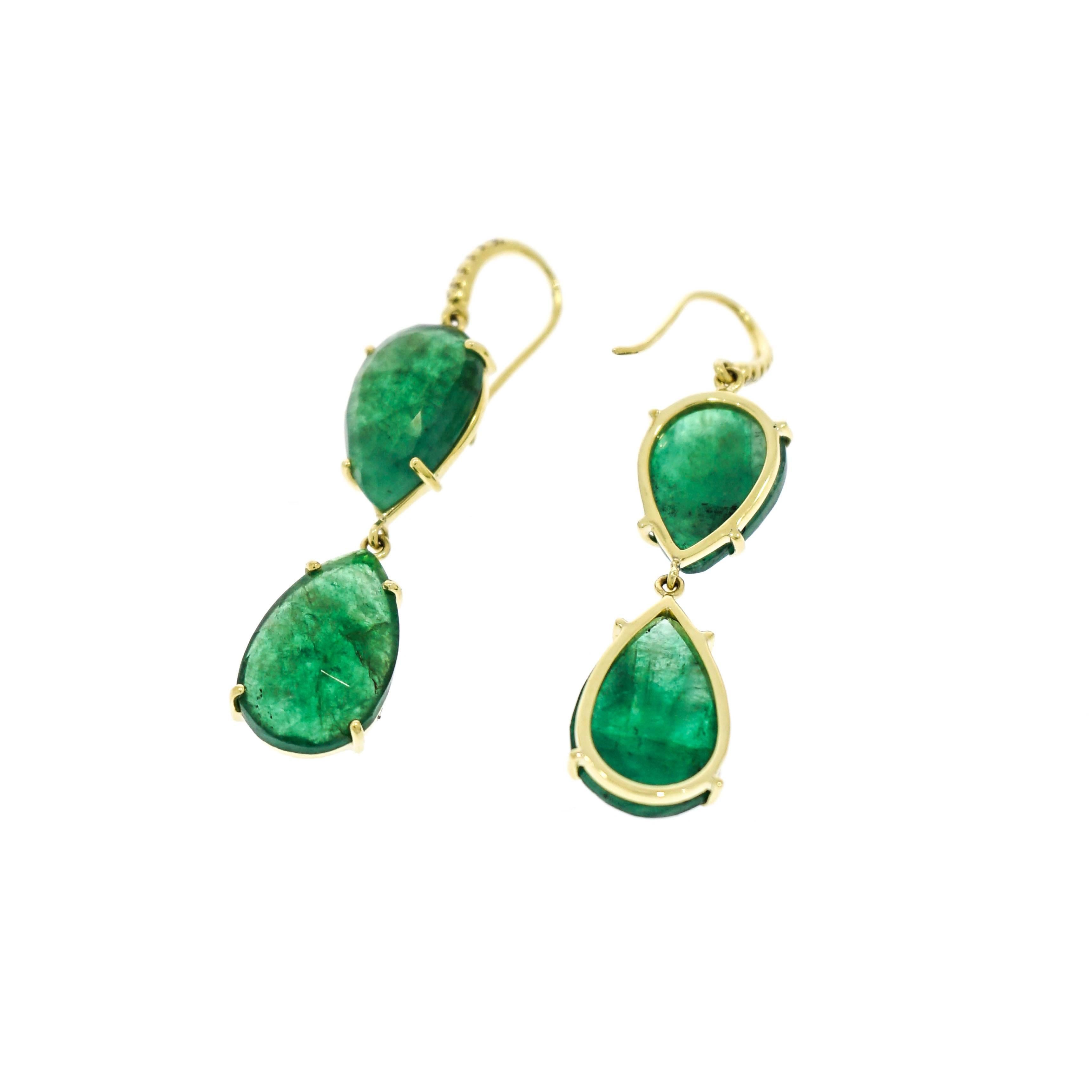 Emerald symbolize rebirth and evoque the freshness of nature... Lauren K designed this pair of Emerald Earrings based on her passion for color, shapes and finding one-of-a-kind stones. 
Handcrafted in 18k yellow gold this less than perfect Emerald