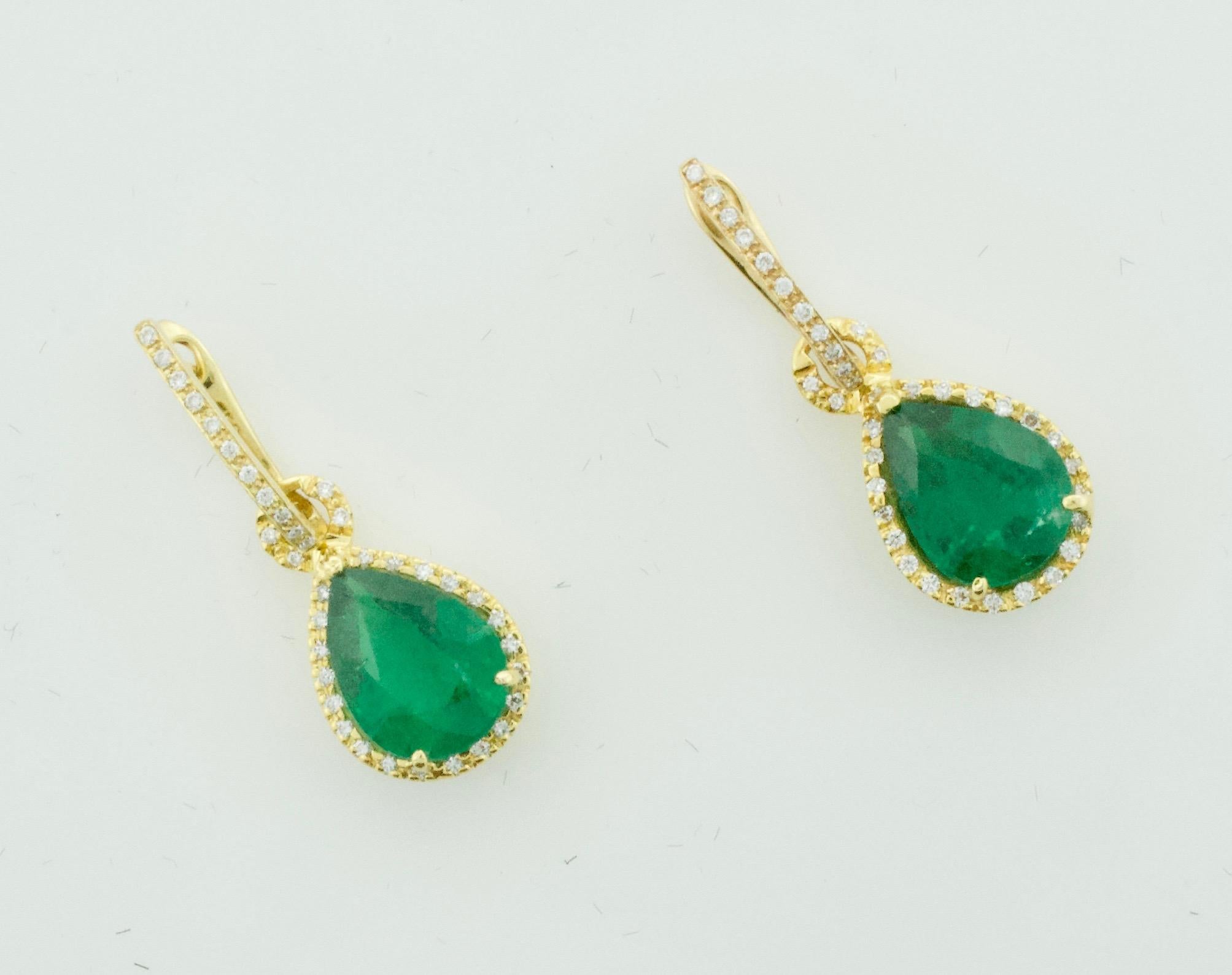 Pear Cut Pear Shaped Emerald and Diamond Earrings in 18 Karat