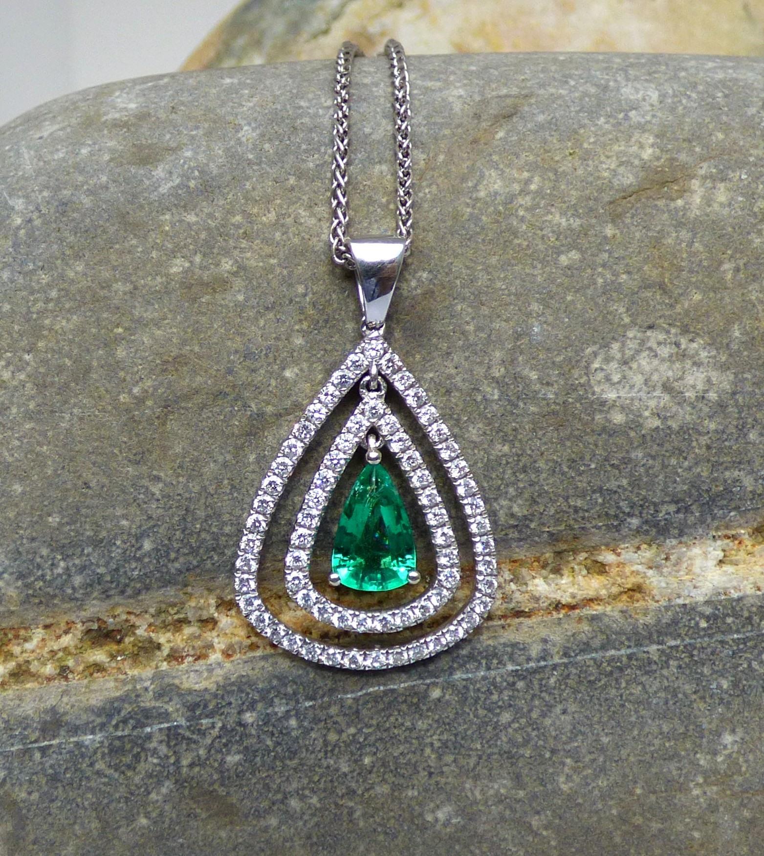 Pear Cut Pear Shaped Emerald and Diamond Pendant For Sale