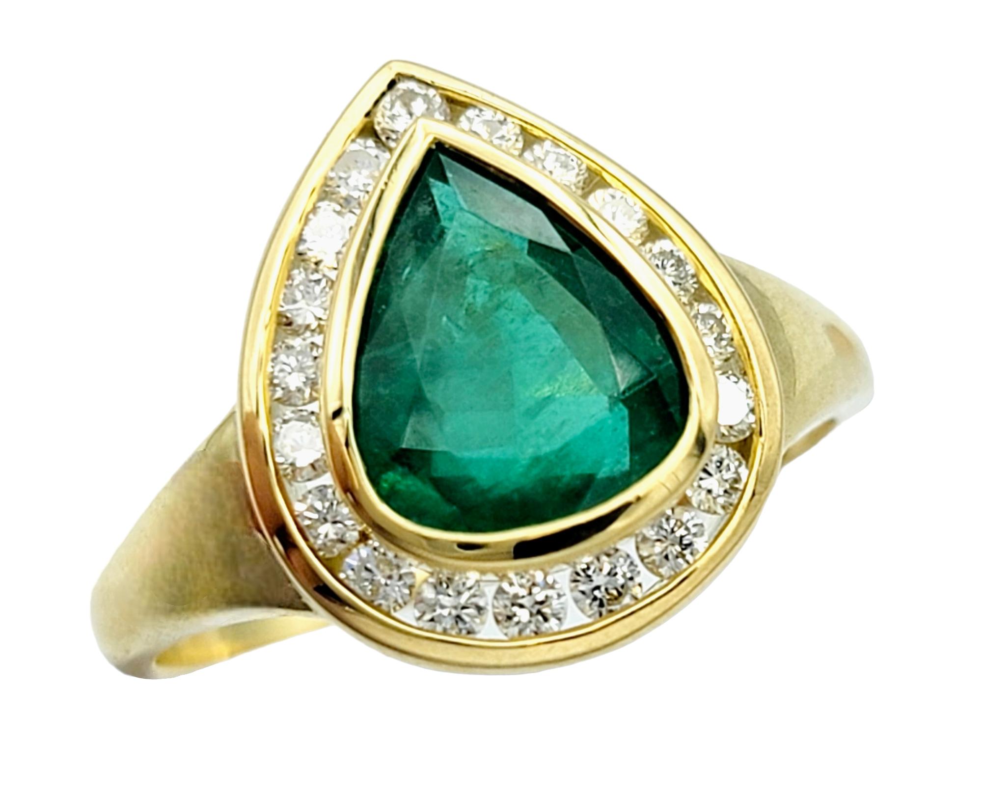 Pear Cut Pear Shaped Emerald and Round Diamond Halo Band Ring Set in 18 Karat Yellow Gold For Sale