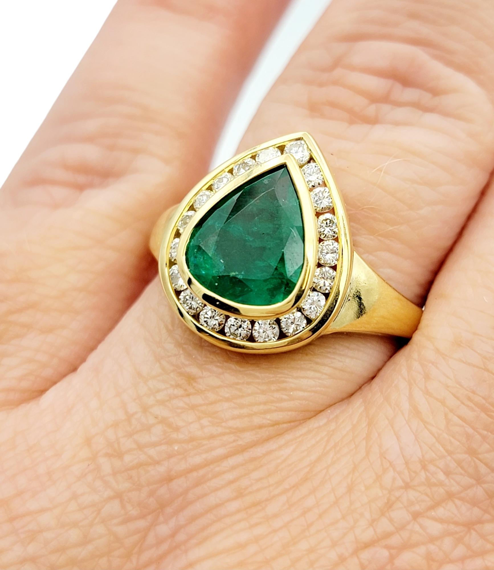 Pear Shaped Emerald and Round Diamond Halo Band Ring Set in 18 Karat Yellow Gold For Sale 1