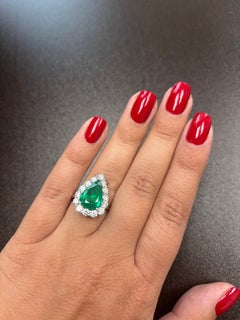 Pear shaped Emerald Cocktail Engagement Ring 14K White