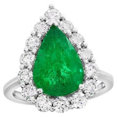 Pear shaped Emerald Cocktail Engagement Ring 14K White